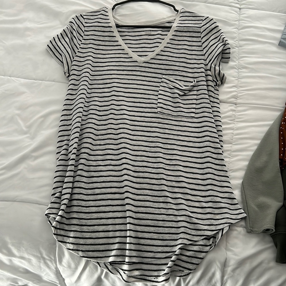 Black and white stripped t shirt with pocket.